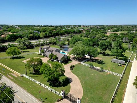 4.15 gorgeous acres with pastures located in the heart of Southlake and only minutes from Vaquero*French Country Design*Remodeled and updated*Located on a picturesque setting w pool,spring fed pond, gazebo, extensive white wood fencing and immaculate...