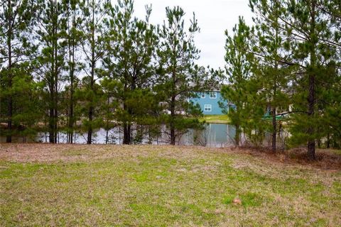 This beautiful Lot is ready for you to build your weekend getaway or full time cabin home and enjoy fishing behind your home. Wildwood Shores is a GATED private community that features 2 boat slips, 2 pools, basketball/tennis courts, BBQ pits, picnic...