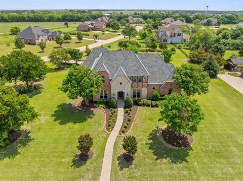 PRICE REDUCED $35,000 to $925,000 from $960,000. A custom built luxury, 4 BR, 4 BA, 3 car garage home on a beautifully landscaped 1.05 acre lot in the gated community of Stone Gate. Hardwood floors in the foyer and living room, a formal dining room w...