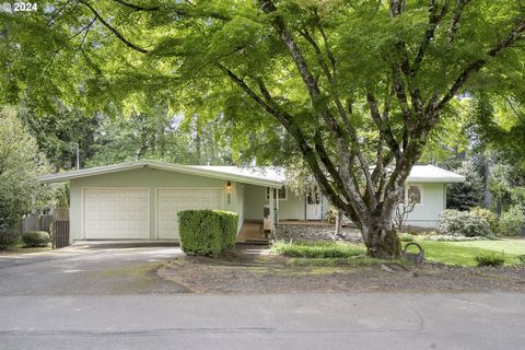 Don't miss out on this incredible opportunity nestled on .64 acres in this sought-after Lake Oswego neighborhood. Step into a charming mid-century modern home boasting main-level convenience. Admire the original hardwood floors with floor-to-ceiling ...