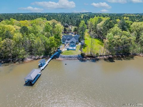 Nestled along the serene shores of the Roanoke Rapids Lake, 336 Windsong Dr. offers breathtaking sunset views, where nature lovers, outdoor enthusiasts, and those seeking a peaceful retreat can find their slice of paradise. Most of the rooms on the m...