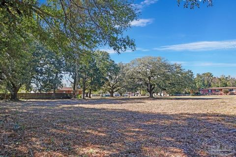 Situated off of 12th Avenue in Pensacola, this .38 acre corner lot presents a rare opportunity to build your dream home in one of the most picturesque settings in the city. As you drive down this charming avenue, you're greeted by the tranquil ambian...