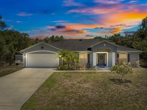 This unique home displays character! It features lovely tile & wood floors throughout-NO carpet! Enjoy a healthier environment with an ozone A/C system and whole-house water filtration. The kitchen shines with gorgeous granite countertops and newer S...