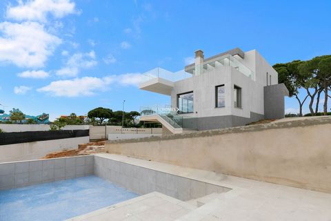 This 3+1 bedroom villa with a private pool is for sale in Quarteira, set within in a central location. The newly built property offers modern living accommodation arranged over three floors. On the ground floor there is a bright open-plan lounge/dini...