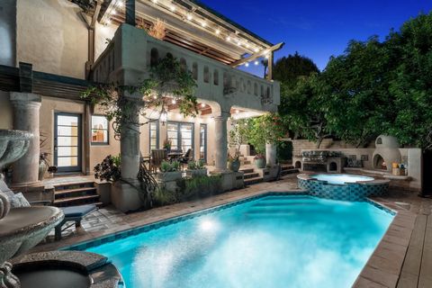 Authentic, Exquisite, Magical...experience a Spanish Revival which will appeal to your most emotional sensibilities. Unparalleled and unspoiled craftsmanship abounds in this home, straight from an era filled with architectural romanticism. The curb a...