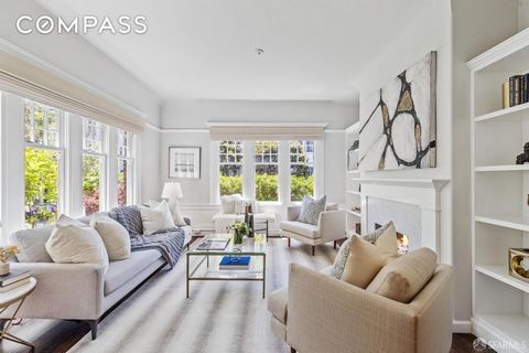 Full-floor flat in prime Pacific Heights! The entrance to this beautiful residence is off a central courtyard enhanced by lush landscaping. A gracious formal entry showcases incredible period details including coved ceilings, hardwood flooring, moldi...