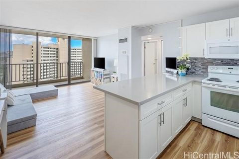 Rarely available on the preferred side and corner location brings in an abundance of natural light. Enjoy expanded vista to a peek-a-boo ocean view. Extensive 2019 renovations: New Kitchen cabinets, Quartz countertop, sink & fixture, disposal & light...