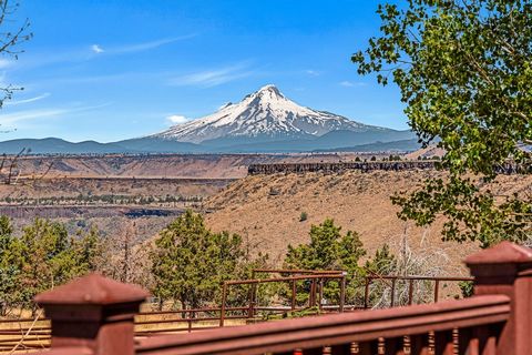 Irrigated farm with pivot, working pens, hayshed and corrals. Set up for cattle and horses, this property has it all. Nice home just above the Deschutes River and Campbell Creek makes for stress free country living. With panoramic Cascade Mountain an...