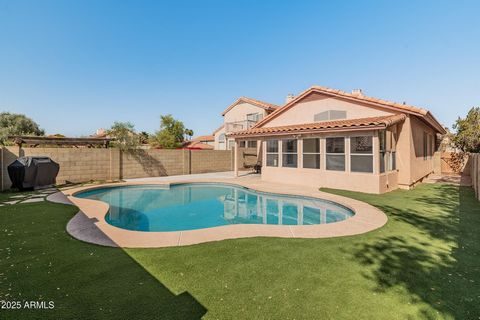 Wow! Unique floorplan, with the downstairs boasting a large room with projector, Office, laundry and 2 bedrooms! The upstairs has living room which flows to Kitchen and Arizona Room, and Primary and a secondary bedroom. Rear yard has sparkling pool a...