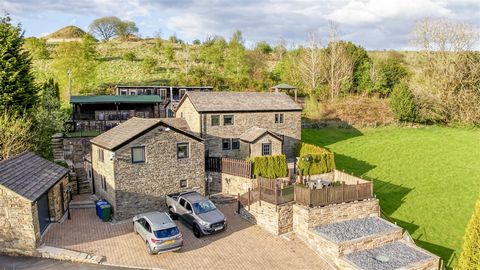 This amazing 4 bedroom home combines quality and quantity with substantial and comprehensive living accommodation on a generous plot of just over 1.1 acres. Multiple reception areas inside and out, offer outstanding entertaining options and versatili...