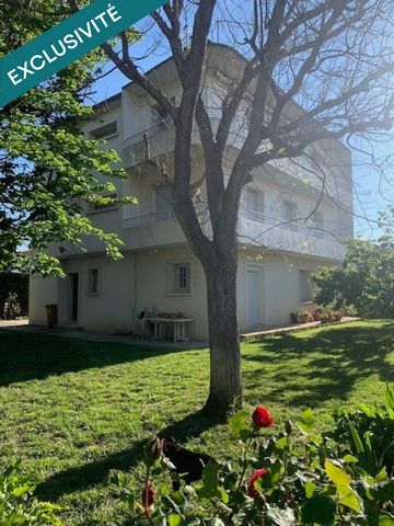 Grande maison avec trois appartements séparés sur joli terrain arboré.