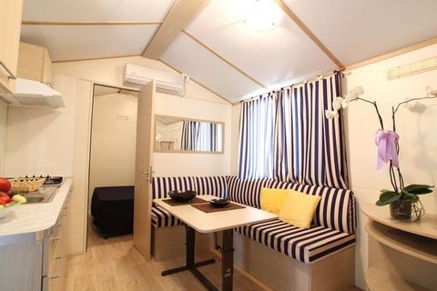 This spacious mobile home with all comfort has a private parking (a second car can be parked at local rate). The holiday park, where this mobile home is, offers many services that you can use including restaurant, pizzeria, supermarket, gym with saun...