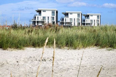 Appartement moderne et confortable au 1er étage avec vue sur la mer Baltique et le port de plaisance. L'appartement se compose d'une cuisine/séjour avec accès au balcon, de deux chambres doubles et une avec deux lits simples et d'une salle de bain av...