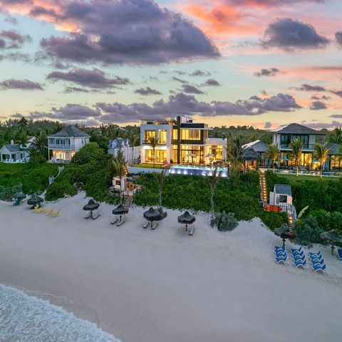 La Palmeraie #2, a pinnacle of modern luxury and coastal elegance nestled within the sought-after Triana Shores on enchanting Harbour Island. This unrivaled beachfront retreat is approximately 9,840 sq.ft and sits on an expansive 11,736 sq.ft beachfr...