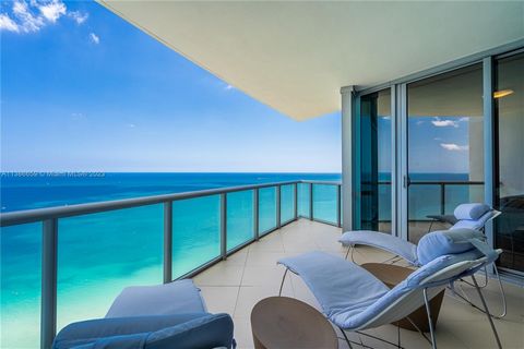 Magnificent, unobstructed, oceanfront & intracoastal/city views! Enjoy the sunrise/sunset from one of four balconies. Step inside this remarkable smart home, designed by the internationally renowned interior designer, Juan Poggi. Features include, Fr...
