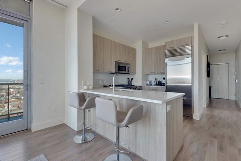 Introducing Unit 24B: A refined two-bedroom, two-bathroom sun-drenched residence in the luxurious 1 Brooklyn Bay Condominium. Enjoy southern and western exposures with a private balcony showcasing captivating views of the Atlantic Ocean and New York ...