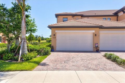 Experience luxury living at its finest in this captivating 2-bedroom PLUS den residence nestled within the Guard-gated golf course community of Sarasota National. This home includes 2 Golf Memberships! This exceptional carriage home offers unparallel...