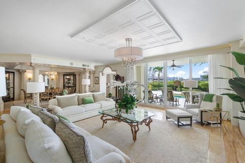 This exceptional residence in Mizner Grand embodies the essence of luxurious living, offering the privacy and elegance reminiscent of a grand estate. Step outside to your own secluded oasis, complete with a private pool and spa overlooking the serene...
