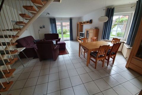 Comfortably furnished semi-detached house with a small garden in a quiet location in the holiday home area. The small family seaside resort of Neßmersiel is located directly on the dike, offers long beaches and dikes and countless opportunities to ma...
