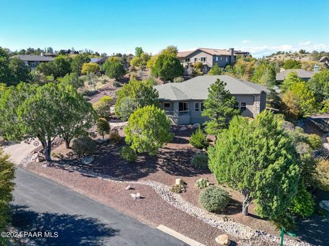 Welcome to this beautifully maintained one-level home at 2122 Plateau in Prescott, AZ. Nestled on a serene 1/2 acre lot, this property offers a spacious layout encompassing 2,492 square feet of living space with a new roof, new HVAC and new exterior ...