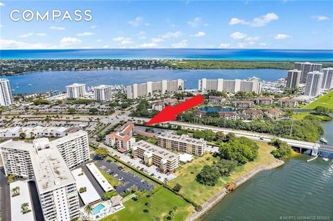 Welcome to this lovely 2 bedroom 2 bath condo nestled in the heart of picturesque North Palm Beach. This is a larger-than-usual condo that offers not only 1400 sq ft of living space but a washer and dryer inside the condo! Full impact glass protectio...