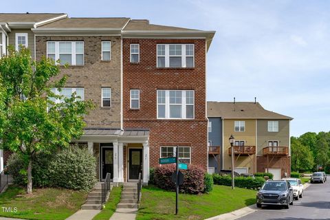 Beautiful brick-front end unit townhome with rear one car attached garage and a concierge lifestyle that includes all exterior home and grounds in the HOA! Explore this tri-level living equipped with first floor bedroom and full bathroom, ideal for g...