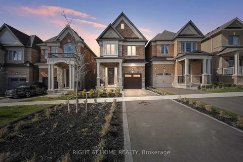 Welcome to 112 Christine Elliott Ave, a residence where luxurious modern updates and exquisite finishes await! Every room in this home is UPGRADED! W-O-W ! This breathtaking Heathwood Homes exudes elegance, featuring an open concept main floor adorne...