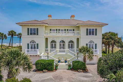 Introducing an Unparalleled Mediterranean Classic Home on the Oceanfront! Welcome to 1277 Debordieu Boulevard, where upscale living meets the breathtaking beauty of coastal South Carolina. This Mediterranean-style oceanfront home is a true statement ...