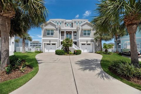 This exceptional coastal 5-bed,5.5-bath Custom Home is located in the sought-after exclusive community of Sunset Cove. This beauty features a beautiful open floor plan with wood floors throughout (absolutely no carpet), white ship lap walls, large pi...