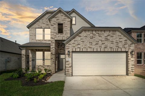 LONG LAKE NEW CONSTRUCTION - Welcome home to 1923 Scarlet Yaupon Way located in the community of Barton Creek Ranch and zoned to Conroe ISD. This floor plan features 4 bedrooms, 3 full baths, 1 half bath, 2