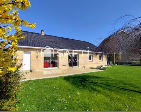 A vendre Plain-pied individuel d'environ 110m2,3 chambres, double garage et jardin clos