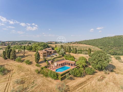 Divided into two levels, the main building is an ancient stone farmhouse of 360 sqm. The ground floor is composed of a living area including a kitchen, dining room, a large living room with fireplace and bathroom. The first floor, instead, is compose...
