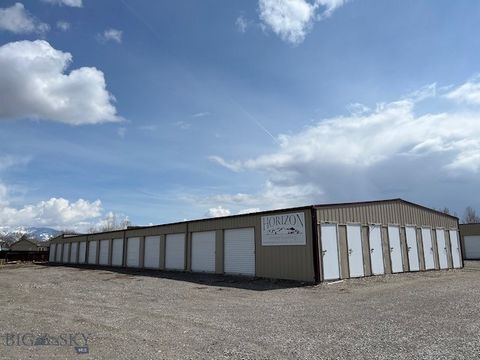 Great income property tucked away, just south of I-90. 49 fully rented enclosed storage units. 12 Boat or RV parking spaces. Two 2 Bed/1BA Live work units 1000SF living and 1000SF shop w/14 ft. roll up doors. Two 3 Bed/2BA 1500SF residential units. L...
