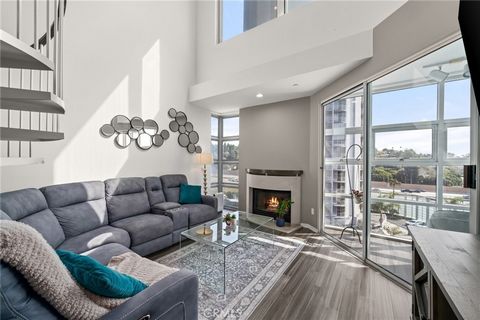 Luxurious condominium in Brentwood boasting an architectural style, featuring impressive 20 ft ceilings in the living room, abundant natural light, and captivating views of Bel Air! This spacious residence offers 2 bedrooms, 2 bathrooms, and a genero...