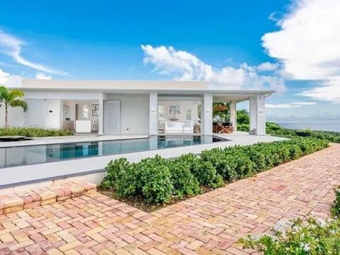 Cool Breeze is a breathtaking home featuring awe-inspiring panoramic sea vistas. The property is set over two levels. The upper level comprises 4 bedrooms, a large pool deck, a kitchen, and living and dining areas. The views from the pool deck are tr...