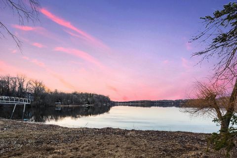 A rare opportunity to build your dream home on 1.9 wooded acres with 120 feet of sandy lakeshore on Christmas Lake. Minnetonka schools, minutes to Excelsior. The natural sloped typography leads to breathtaking views and extraordinary privacy. Make yo...