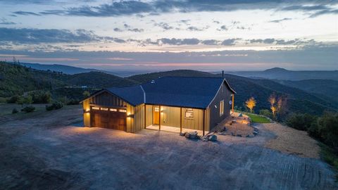Nestled atop a serene knoll, this newly constructed home offers a vista straight out of a Hollywood film! From every vantage point, you'll feel like you're suspended between earth and sky, taking in miles of picturesque scenery from rolling hills to ...