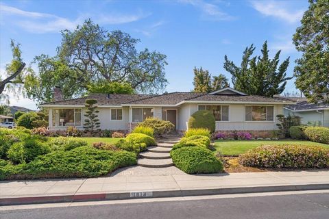 Wonderful floor plan in the Serene heart of Silicon Valley. Warm welcoming formal entrance opens to expansive Living room with large windows, fireplace and slider. Separate Dining room and Family room with an abundance of space. Den/office with attac...