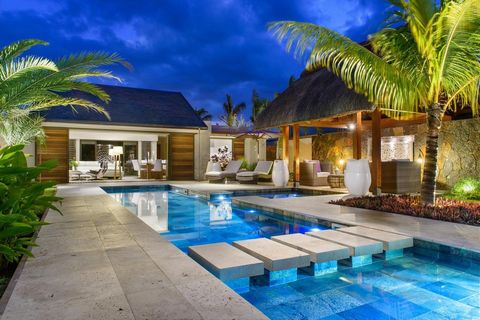 Villa with pool surrounded by a private garden – Clos du littoral – Mauritius.   The villa is composed of 3 bedrooms with en-suite bathrooms. The space is optimized favoring comfort and the use of noble materials. Its living space is an elegant combi...