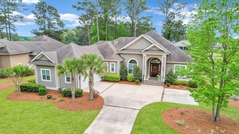 Welcome to luxury living in Hampton Hall! This remarkable 4BD/4.5BA home offers breathtaking views of the championship Pete Dye golf course and serene lagoon. Inside, you'll find a formal dining room, and open-concept eat-in kitchen and living room. ...
