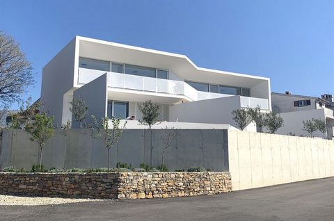 The island of Krk, town Krk, attractive house surface area 324,15 m2 for sale, with two duplex apartments with private pools and sea view. Apartment A surface area ??153 m2 consists of basement with garage and storage room, ground floor with living r...
