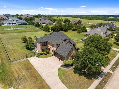 Welcome to this enchanting old-world architectural-style home, where timeless elegance meets modern comfort. This exquisite home features hand-scraped oak floors and beautifully crafted wood beams that exude timeless elegance. The mix of stone elemen...