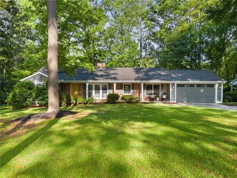 Gorgeous renovated brick ranch home on a private and level lot in Smyrna’s sought-after Forest Hills! A covered rocking chair front porch provides a great welcome, setting the tone for the warmth and character found within. Inside, you’ll notice the ...