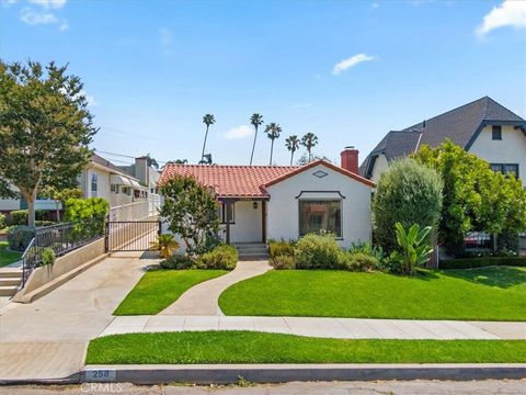 Nestled in the heart of Belmont Heights estate section, one of Long Beach's most coveted neighborhoods, this Spanish-style residence offers a blend of timeless elegance and modern comforts. With its brand new distinctive red tile roof, arched doorway...