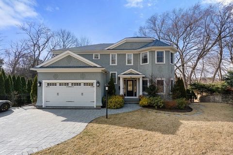 This contemporary colonial is set on a quiet cul-de-sac in West Newton Hill and features 3,976 sq.ft. across three levels, including six ensuite bedrooms and multiple outdoor entertaining spaces. The open-plan living main level features a gas firepla...