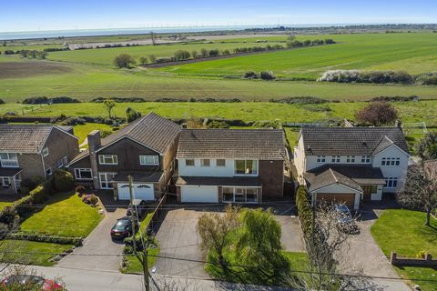OVERVIEW GUIDE PRICE £650,000 TO £700,000 Welcome to this beautiful family residence situated on the charming Church Lane in the picturesque village of Great Holland. This stunning property offers an impressive blend of warmth, elegance, and contempo...