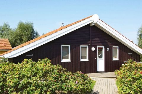 86 m & # 178; large cottage located at the end of closed road (wings). This Danish wooden holiday home in Scandinavian design with bright, wood-clad walls and sloping walls is located only 50 m from the canal in the Water and Landscape Park in the se...