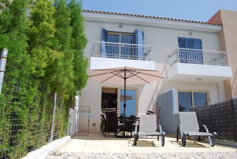 Two Bedroom Townhouse for Sale in Universal, Paphos with Title Deeds Available This two bedroom townhouse is located on a popular luxury complex with a spa and fitness centre and a heated indoor swimming pool in addition to two exterior swimming pool...