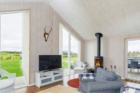This bright cottage with whirlpool and sauna located by Virksund offers lots of exciting details. The house is very well furnished with four bedrooms. There is modern furnishings, free internet and TV with international channels. Two bathrooms with s...