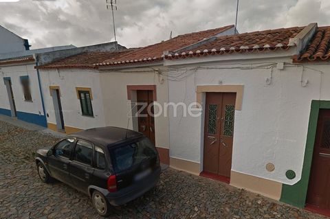 Identificação do imóvel: ZMPT566044 Charming and welcoming villa located in Faro do Alentejo, comprising two bedrooms, a cozy living room, a hallway and a kitchen. The backyard includes a bathroom and an outbuilding that provides access to the adjace...
